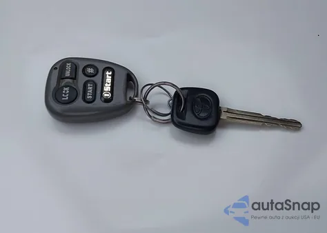 2003 Toyota Corolla Le z USA, uszkodzony, nr VIN 2T1BR32E43C002577